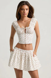 Ruched Cotton-Poplin Mini Skirt in Rose Print