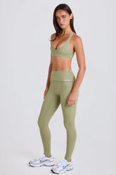 Four-Way Stretch Foldover Mid-Rise Stirrup Leggings in Matcha