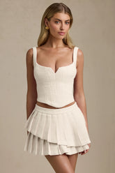 Layered Pleated Low-Rise Mini Skirt in Ivory
